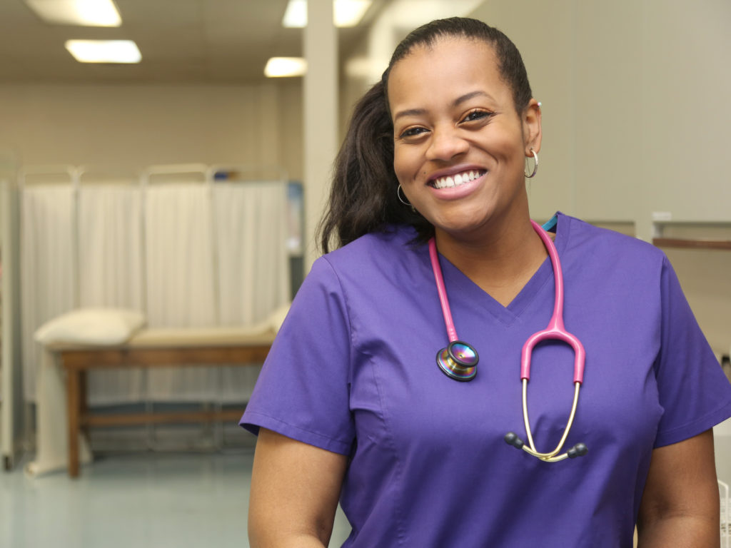 Smiling Nurse African American in Hospital