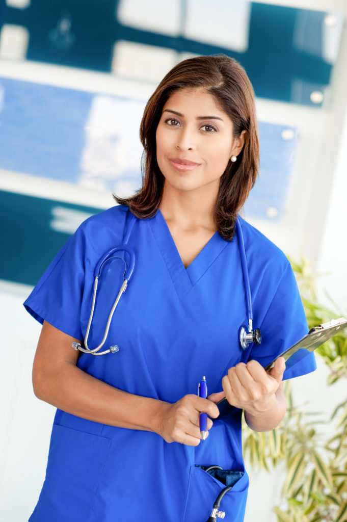 Young Woman Hispanic Doctor Nurse in Medical Office